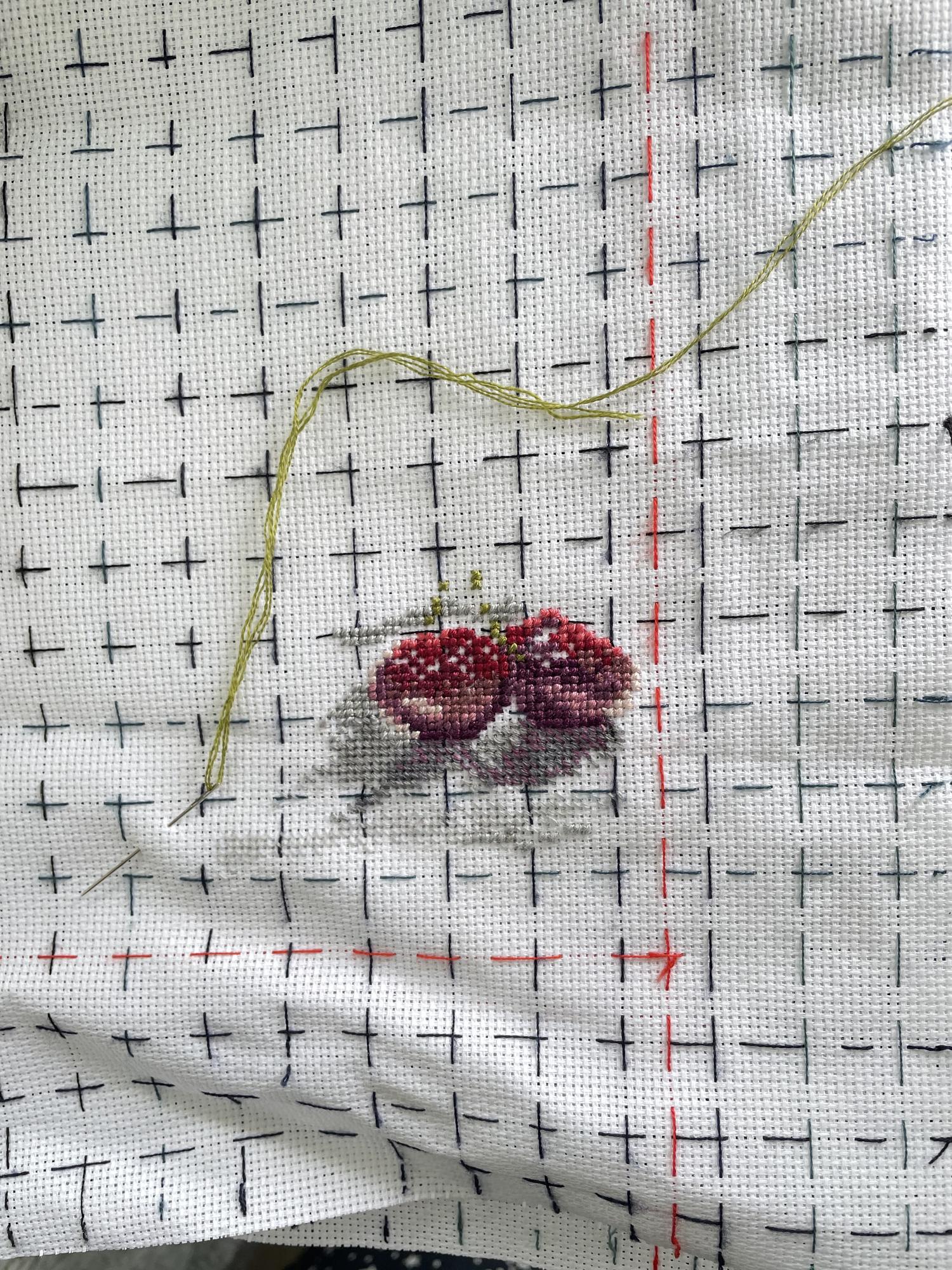 Delicate embroidered sampler on linen
